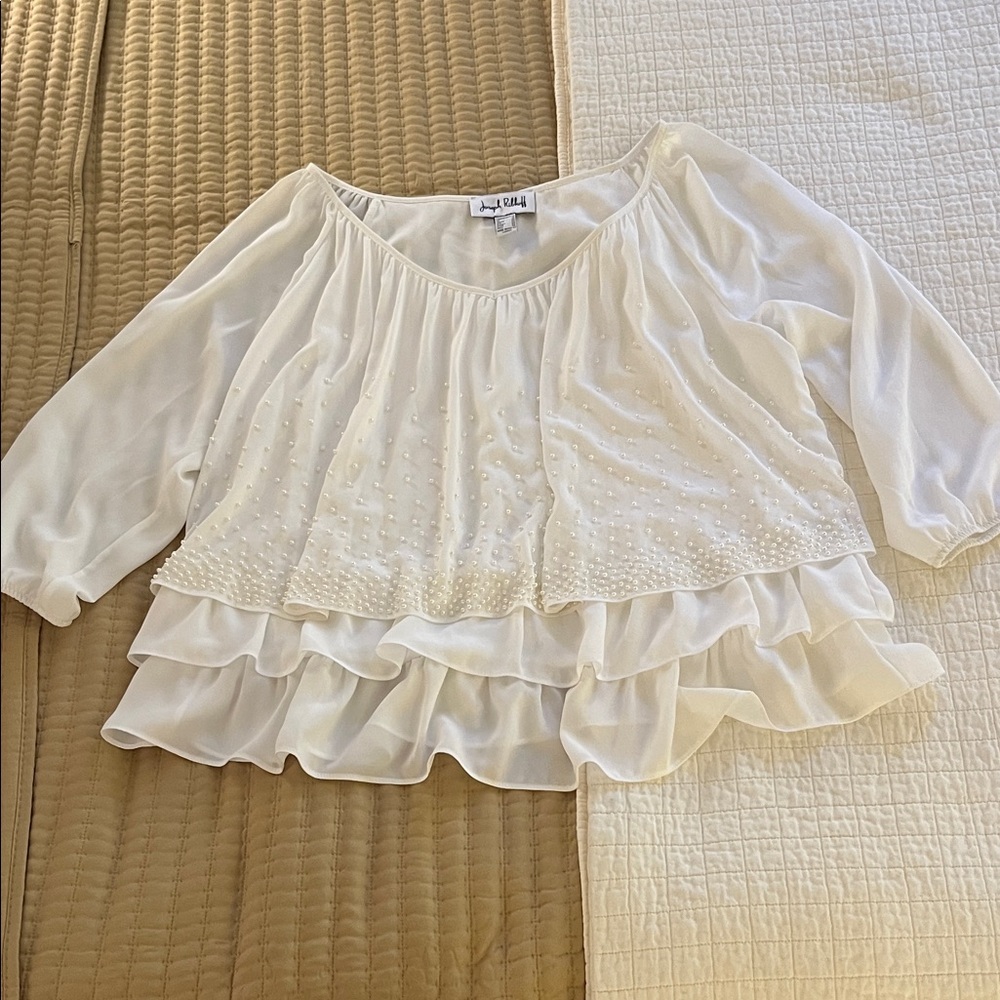 Joseph Ribhoff off white v-neck blouse.